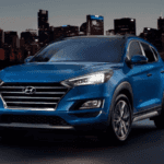 2020 Hyunda Tucson parked near city skyline