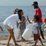 Cleaning the beach and A Woman and Girl Doing High Five