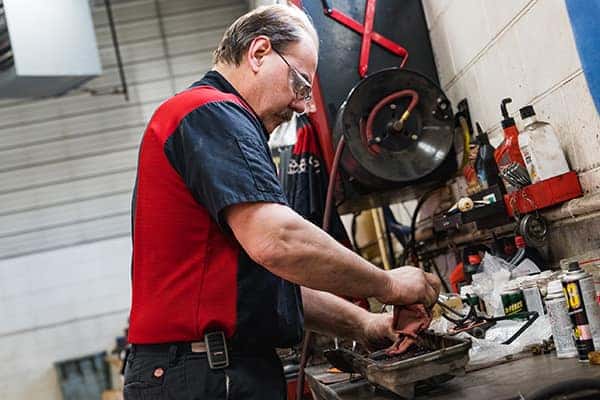 a toyota certified technician working on a toyota at anderson weber toyota in dubuque iowa