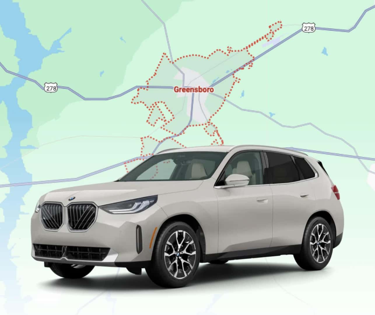 White BMW SUV displayed with Greensboro area map showing dealership locations