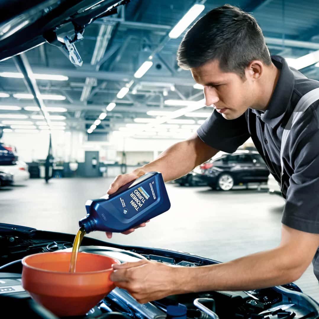 Mechanic Changing Oil