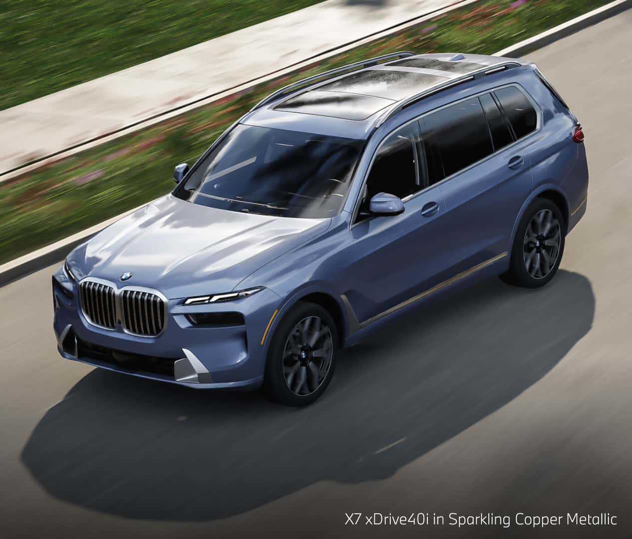 BMW X7 xDrive40i in Sparkling Copper Metallic driving down a road