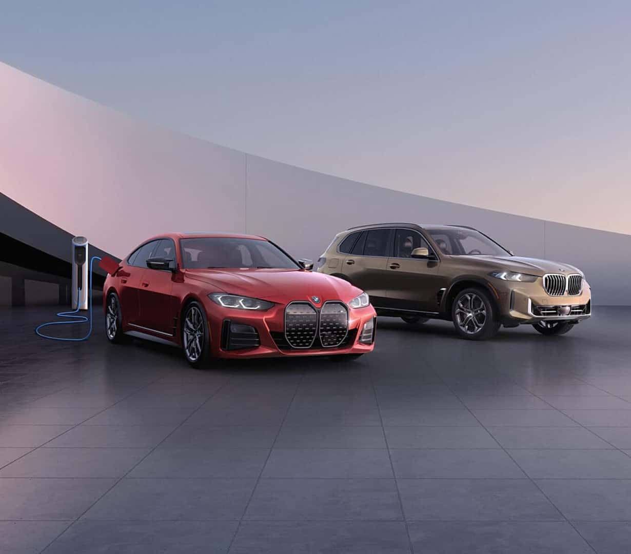 BMW Certified MY22 i4M and MY24 X5 xDrive50e LCI parked at a charging station