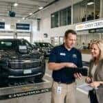 chevy certified service lane with advisor speaking with customer