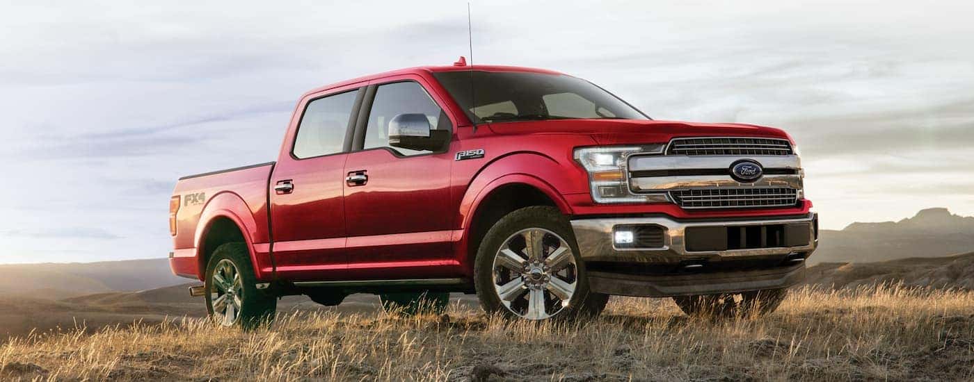 A red 2018 Ford F-150 parked after leaving used truck dealership.