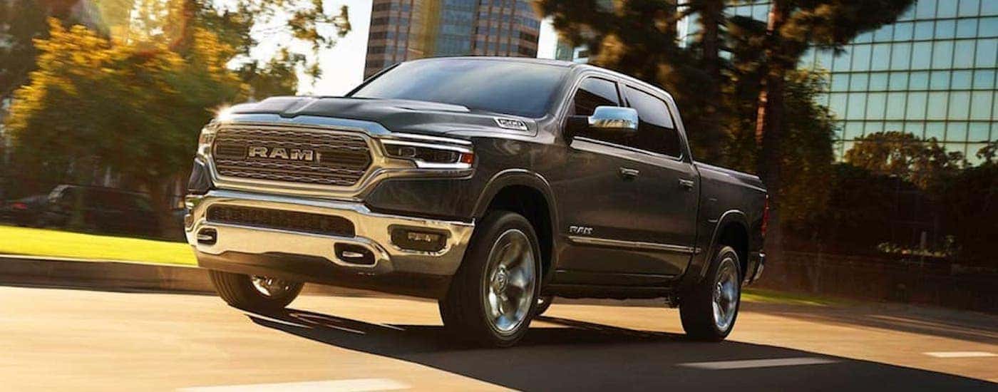 A grey 2019 Ram 1500 driving outside of Raleigh, NC