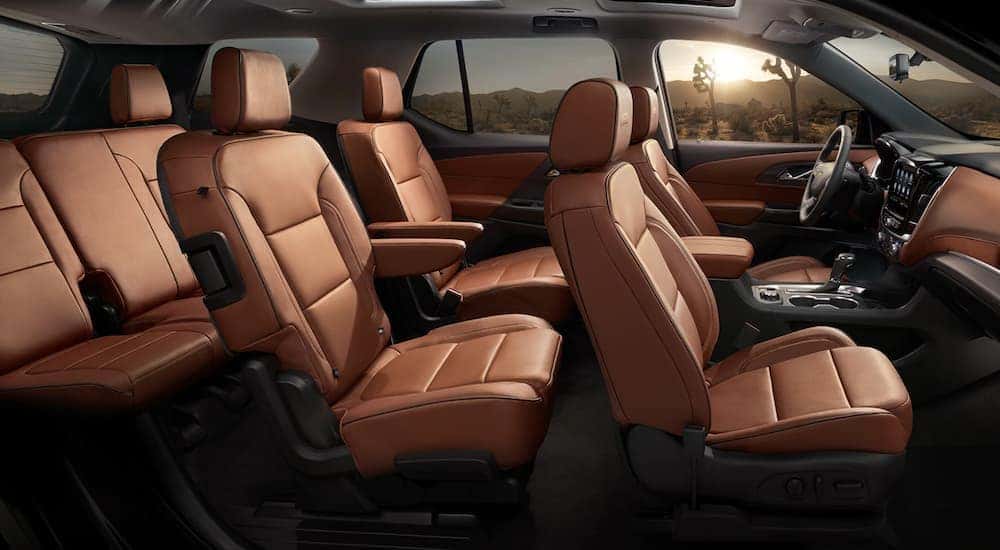 Three rows of brown leather seating in a 2020 Chevy Traverse.