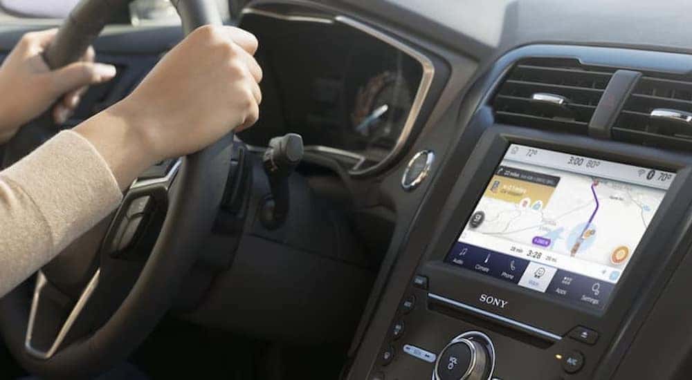 A close-up of the infotainment screen in a 2021 Chevy Malibu for sale near Wake Forest.