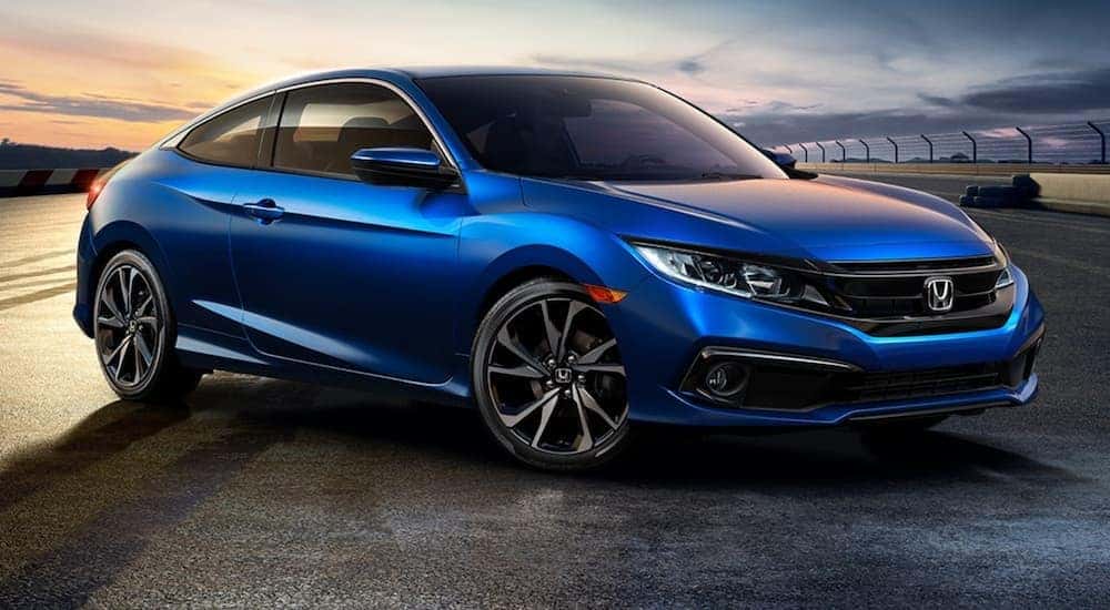 Blue 2020 Honda Civic Sport parked on a track