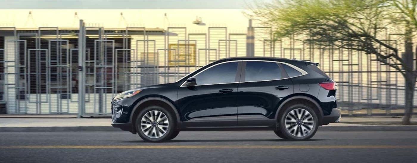 A black 2022 Ford Escape from the side.