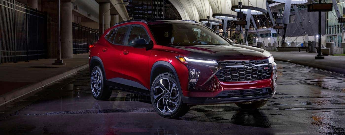 A red 2024 Chevy Trax RS from a used car dealership in Hillsborough