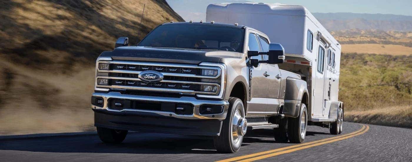 A grey 2023 Ford F-350 from the front after leaving a dealer that has used trucks for sale near Caldwell.