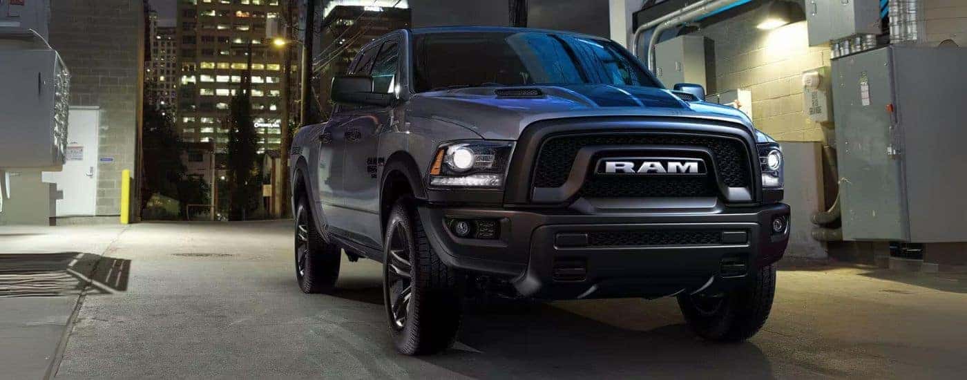 A black 2023 Ram 1500 Classic from a dealer with used trucks for sale near Butner