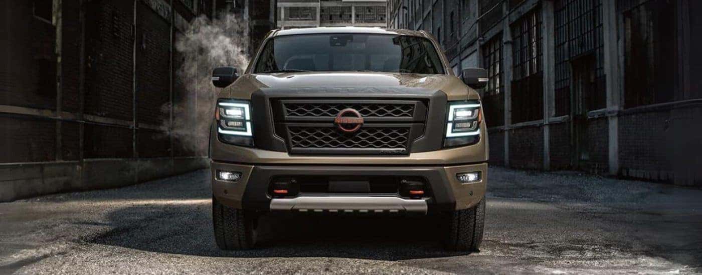 Brown 2024 Nissan Titan parked in an alley
