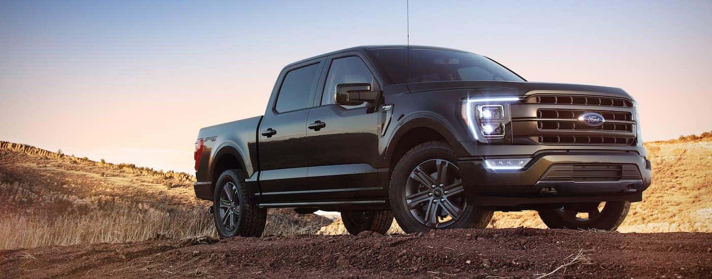 A black 2022 Ford F-150 from the side.