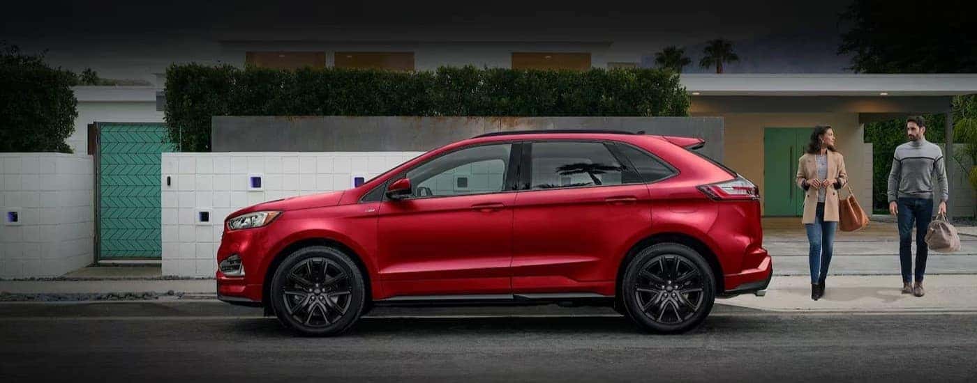 People walking near a 2024 Ford Edge.