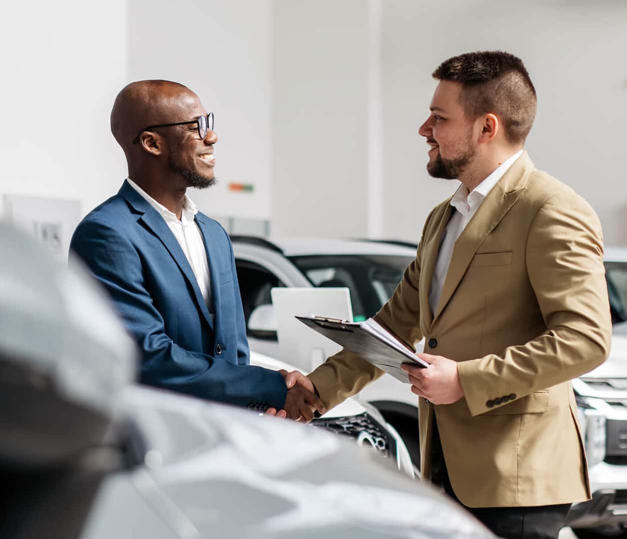 A Hyundai employee assisting a customer