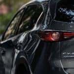 A gray 2020 Mazda CX-5 is shown from the rear. See one at your local Mazda dealer.