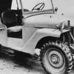 A black and white photo is showing a 1940 used Jeep Wrangler.