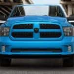 A blue 2020 Ram 1500 Classic is shown from the front in a parking garage.