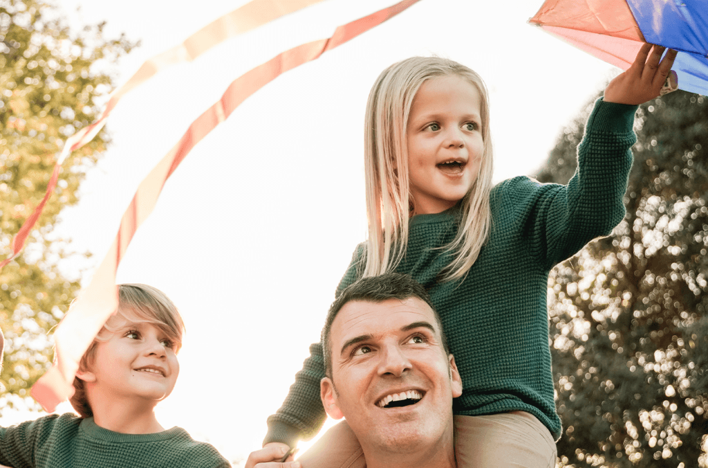 Hyundai Dealer Near Philipsburg | Family flying a kite together