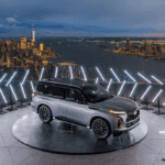 Gray 2025 INFINITI QX80 on New York City skyscraper