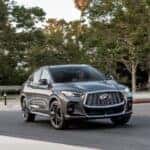 Graphite Shadow 2023 INFINITI QX55 with driver