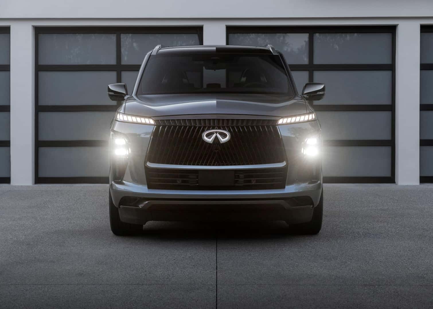 Anthracite Gray 2025 INFINITI QX80 front grille with headlights