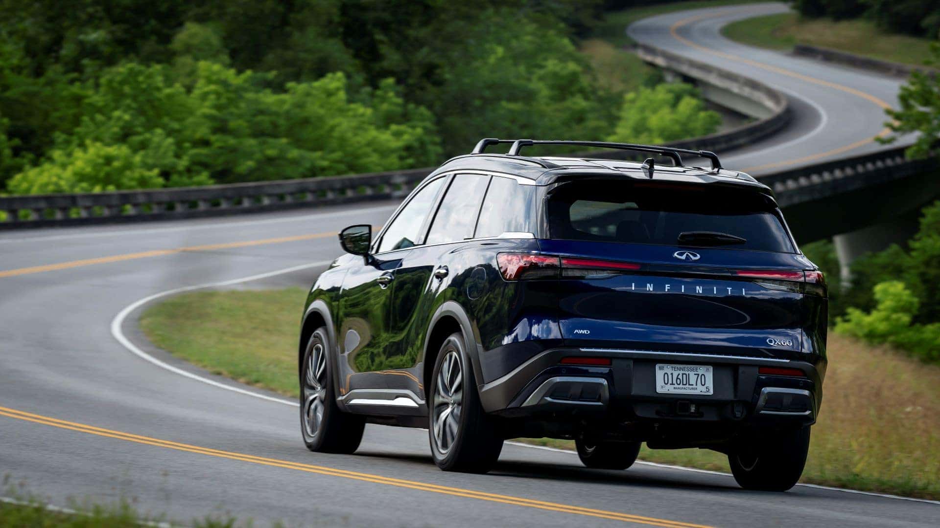 Grand Blue 2024 INFINITI QX60 rear view