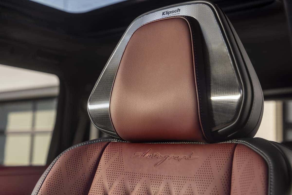 2025 INFINITI QX80 burgundy seat with Klipsch audio system