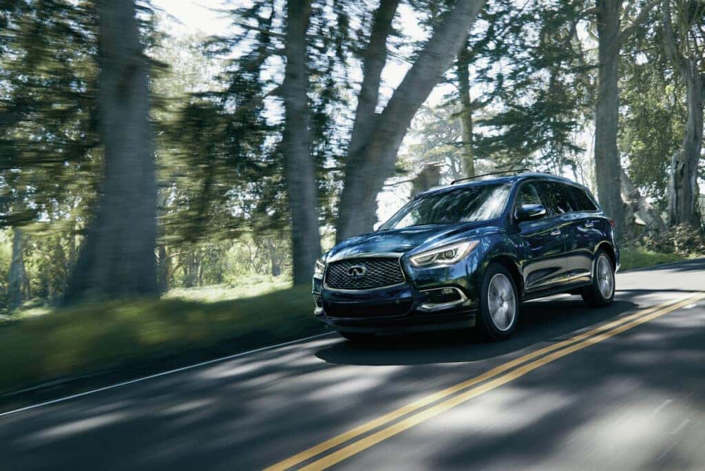 2025 INFINITI QX60 Grand Blue in motion