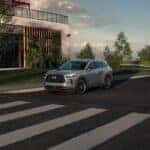 2025 INFINITI QX60 Front Side View on the Road