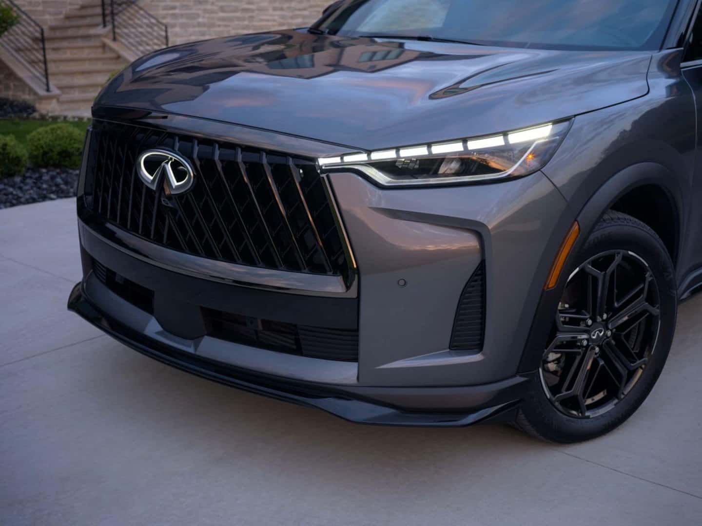 The Vertically Barred Grille Of The Efficient 2026 INFINITI QX60 SPORT