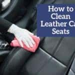 a hand cleaning car leather seats