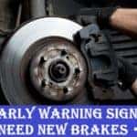 a man's hand doing braking repairs