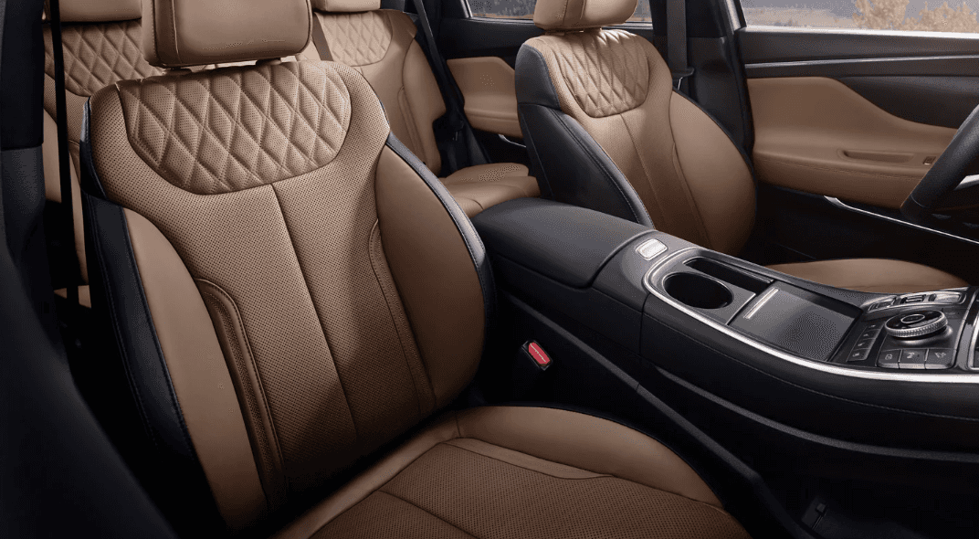 The interior of a 2023 Hyundai Santa fe SUV, showcasing modern design, spacious seating, and advanced technology features.