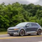 2023 IONIQ 5 riding in the background