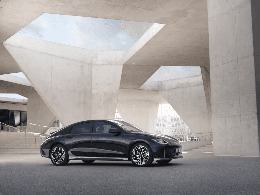 2023 Hyundai IONIQ 6 parked under modern architecture