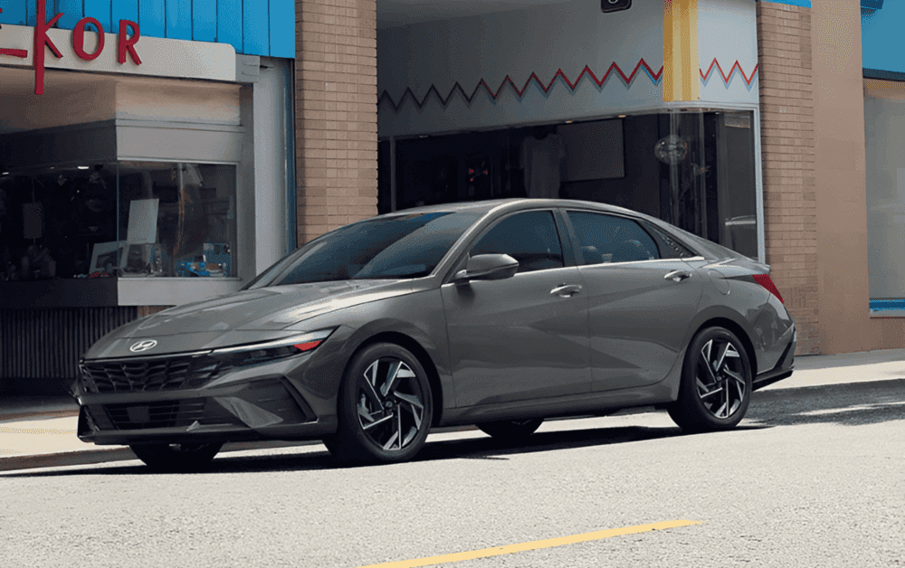 2025 Hyundai ELantra Hybrid parked in front of a city street