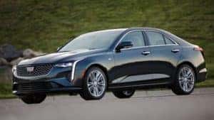 A black 2020 Cadillac CT4 facing left