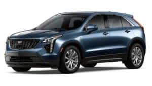 A blue 2020 Cadillac XT4 is facing left.