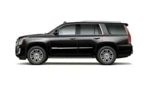 A black 2020 Cadillac Escalade is shown facing left from the side.