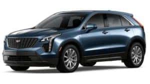 A blue 2020 Cadillac XT4 is facing left.