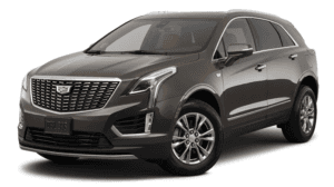 A brown 2020 Cadillac XT5 is angled left on a white background.