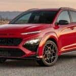 The 2023 Hyundai Kona driving on a road