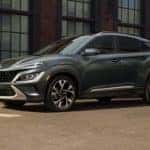The 2022 Hyundai Kona parked outside a building in a city like Nashville, TN.