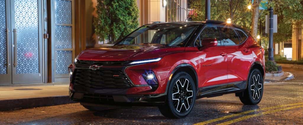 Chevrolet Blazer parked outside in dark night
