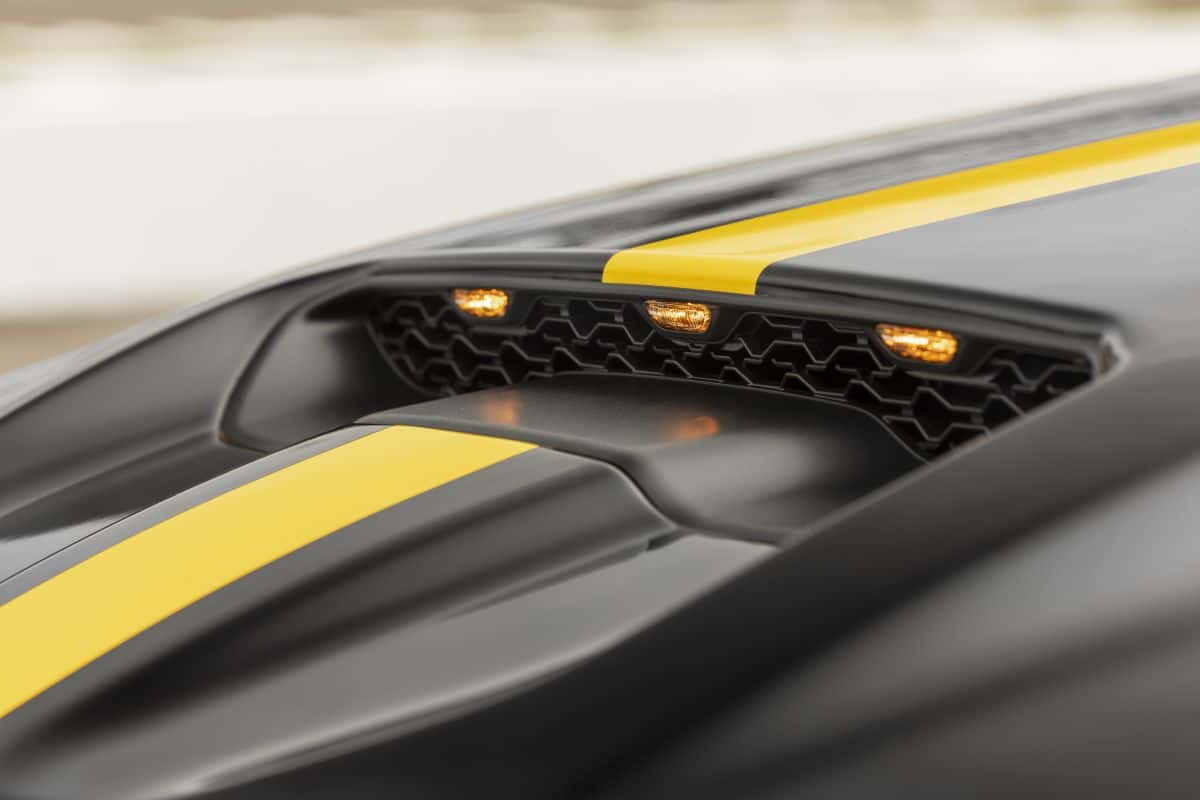 Aggressive street-performance hood scoop and Solar Yellow body accents on the 2027 Ram 1500 Rumble Bee