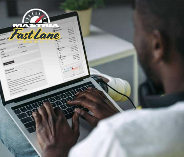 Man typing on a computer