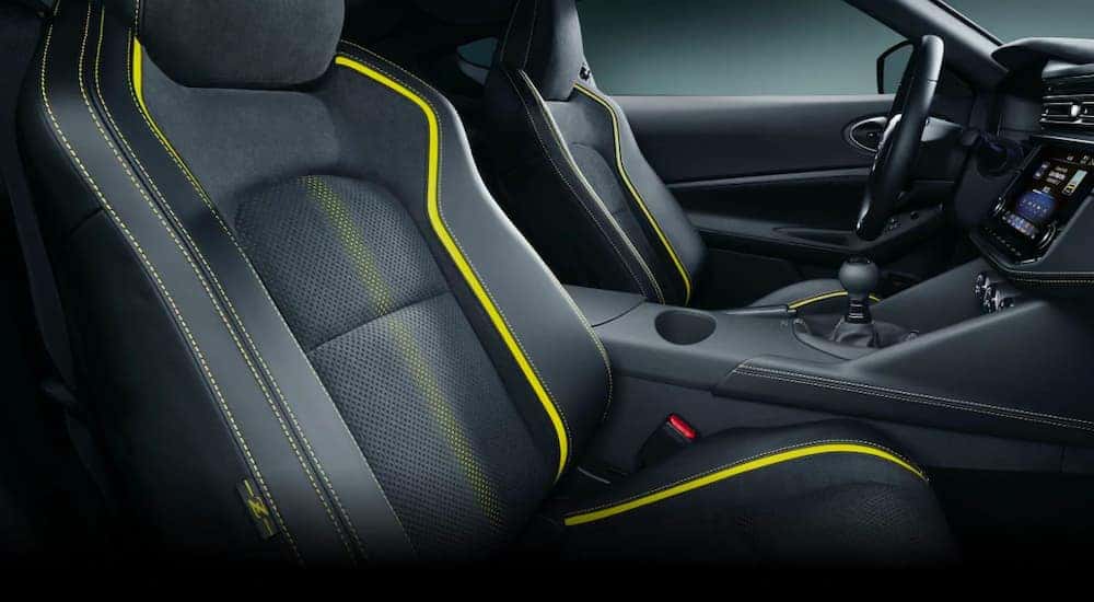 A closeup is shown of the front black seats with yellow accents on a 2021 Nissan Z Proto.